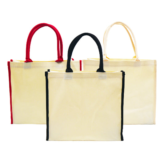 A front view of eco-friendly canvas tote bags in 3 colours
